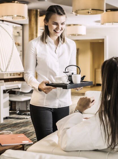 Franziska serves tea at Hotel Theresa Zillertal