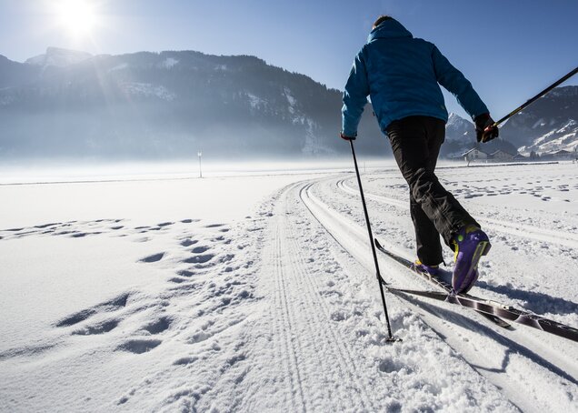 A man cross-country skiing in the winter near Hotel Theresa in Zillertal